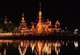 Thailand: Wat Chong Kham (Jong Kham) and Wat Chong Klang (Jong Klang) sparkle at night across Chong Kham (Jong Kham) Lake, Mae Hong Son, northern Thailand